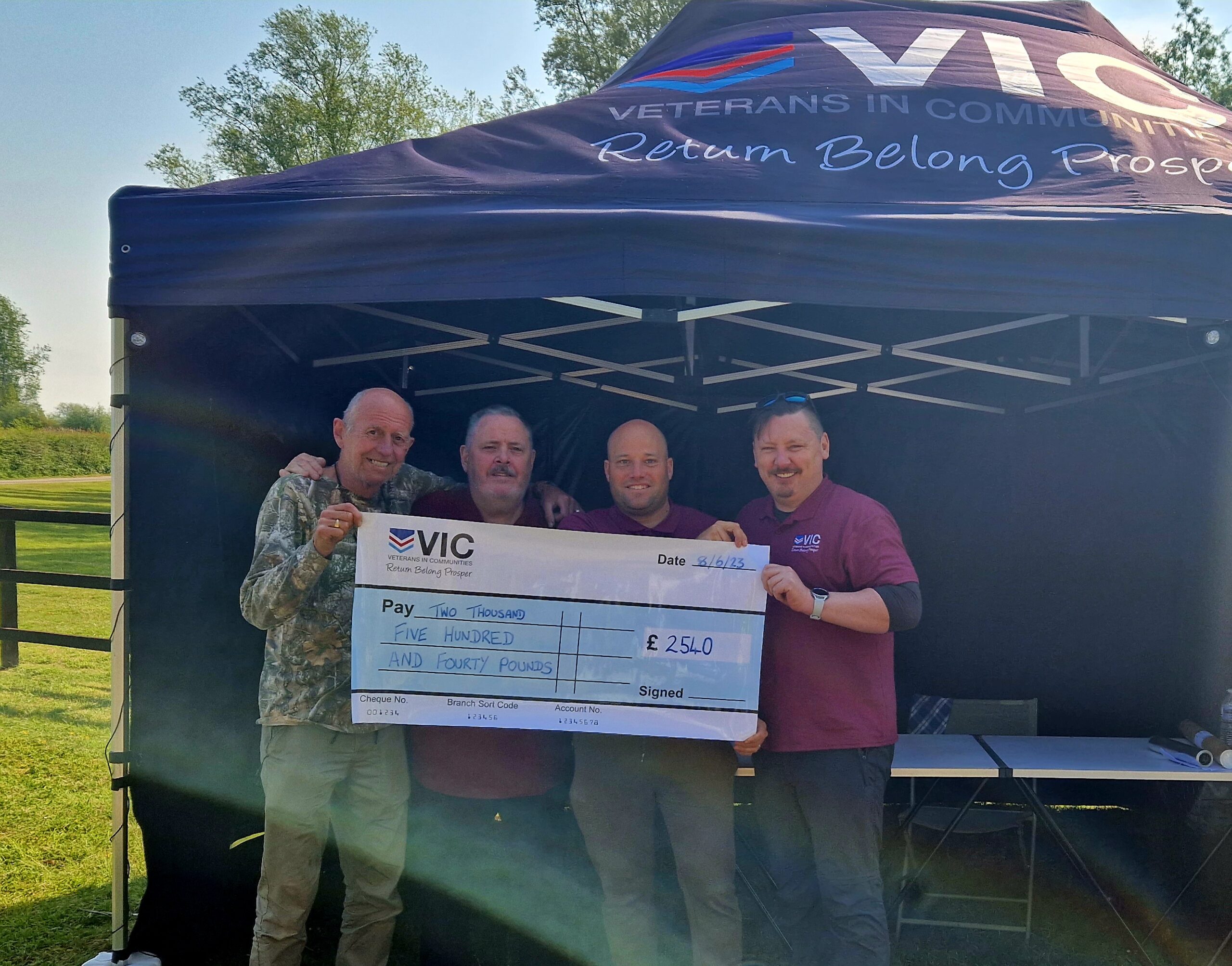 Anglers gathering for a bankside social at an exclusive UK carp lake booking raising money for charity